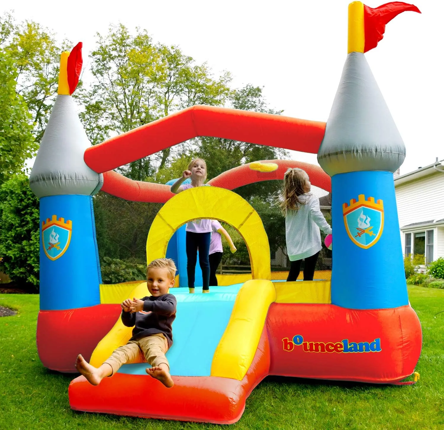 Bounceland Bounce House Castle with Basketball Hoop Inflatable Bouncer, Fun Slide, Safe Entrance Opening, UL Certified Strong Blower Included, 12 ft x 9 ft x 7 ft H