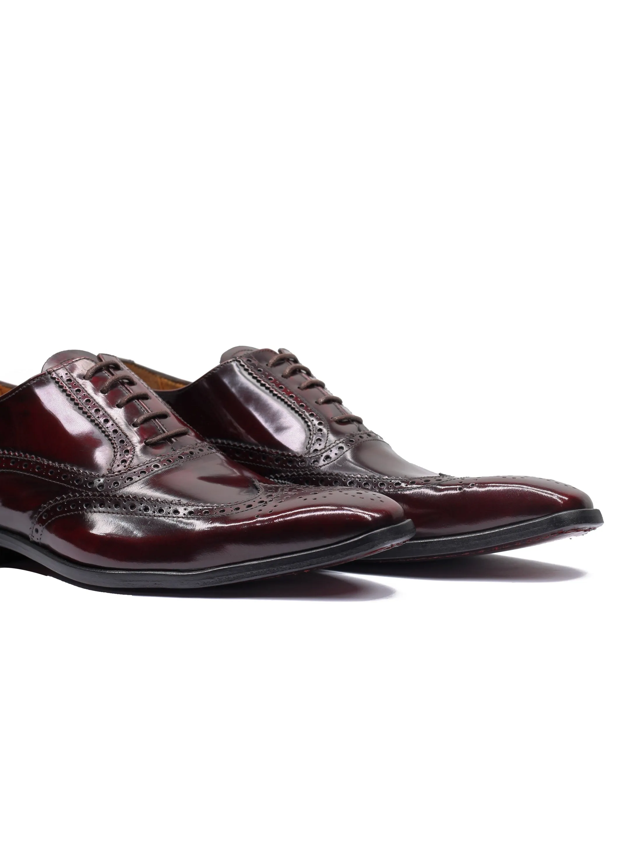 POLISHED CALF LEATHER BROGUES IN BURGUNDY